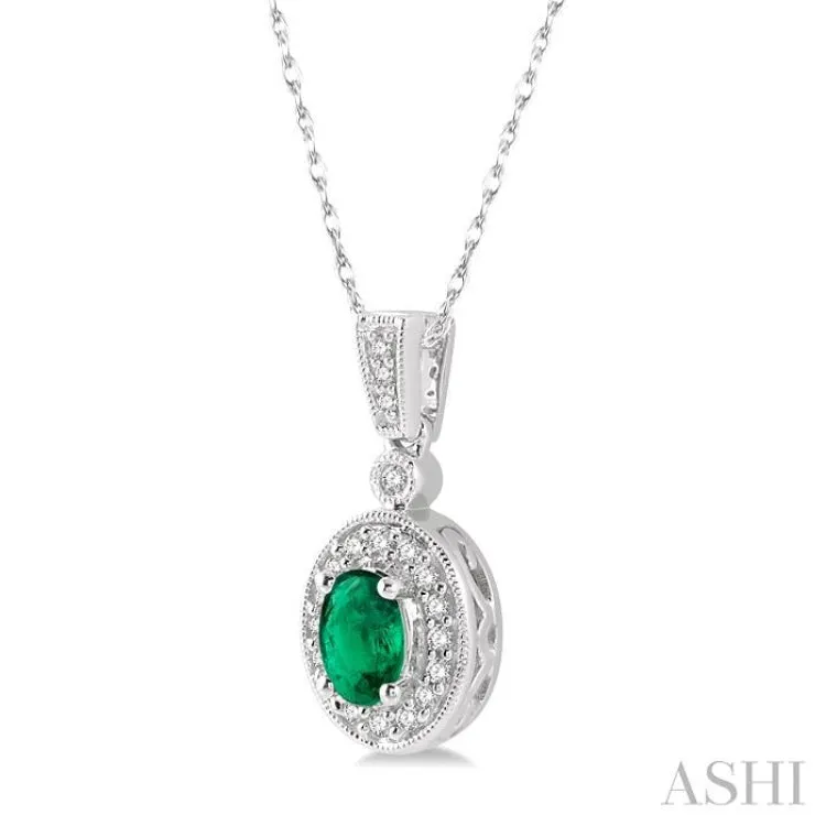 6x4mm Oval Cut Emerald and 1/8 Ctw Round Cut Diamond Pendant in 14K White Gold with Chain