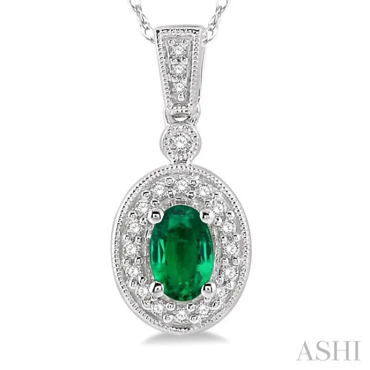 6x4mm Oval Cut Emerald and 1/8 Ctw Round Cut Diamond Pendant in 14K White Gold with Chain