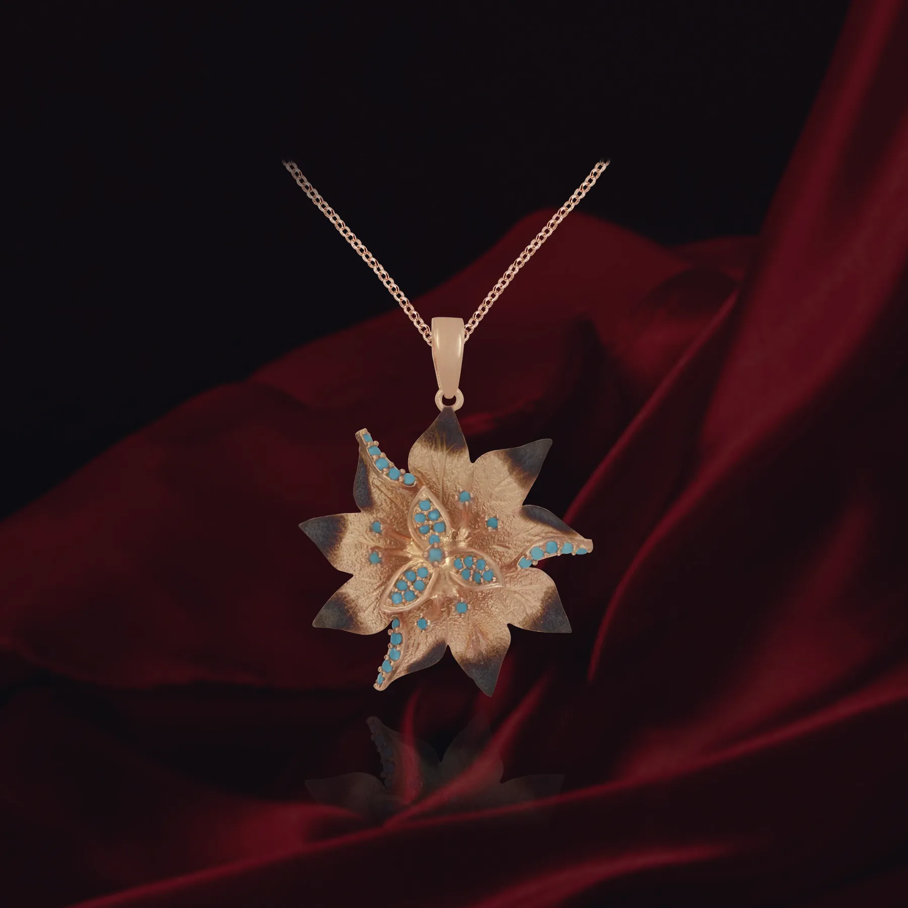 Ember Desert Flower with Sparkling Blue Accents Pendant