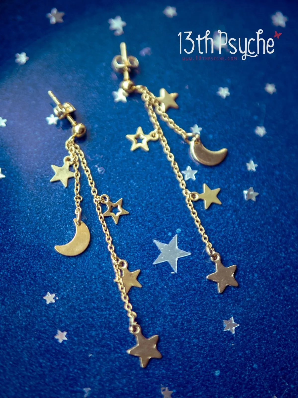 Gold moon and stars dangle earrings